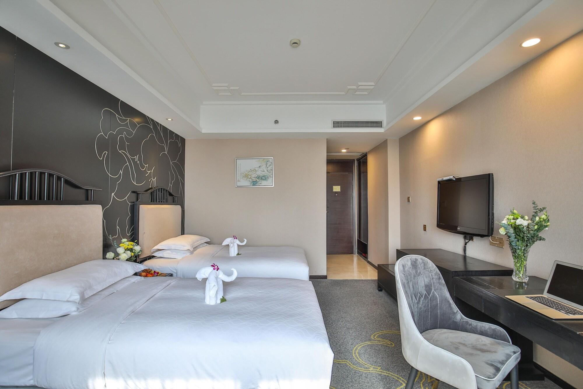 Veegle Hotel Kansan Kültér fotó