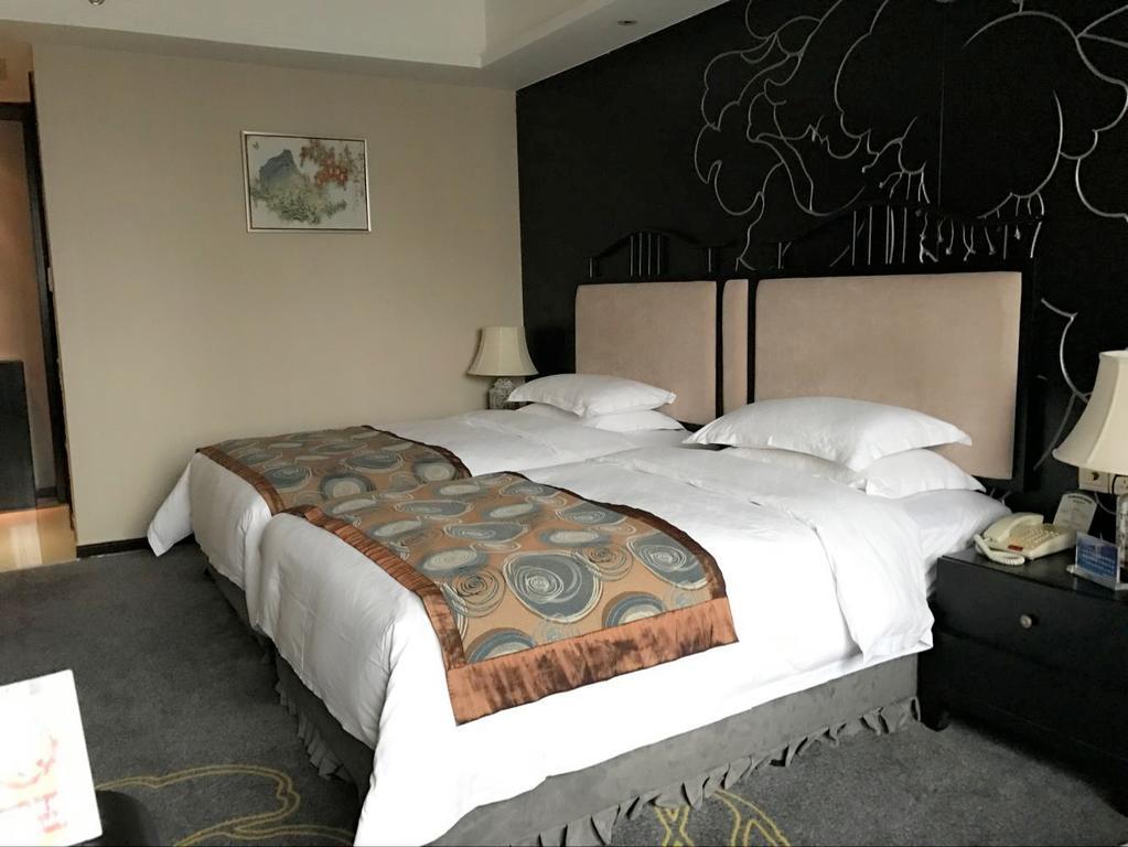 Veegle Hotel Kansan Kültér fotó